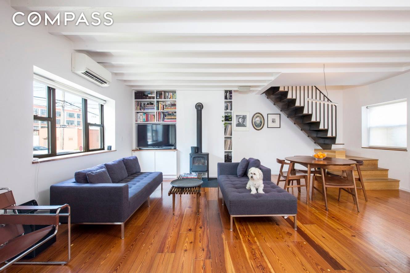 Right on the border of Carroll Gardens, situated in trendy Red Hook on a residential block sits this impeccably renovated and thoroughly modernized home with a landscaped rooftop garden and ...