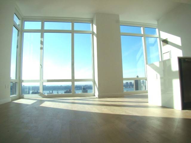 1 Bed w/ Direct River Views , Luxury and Light in the Heart of NYC!