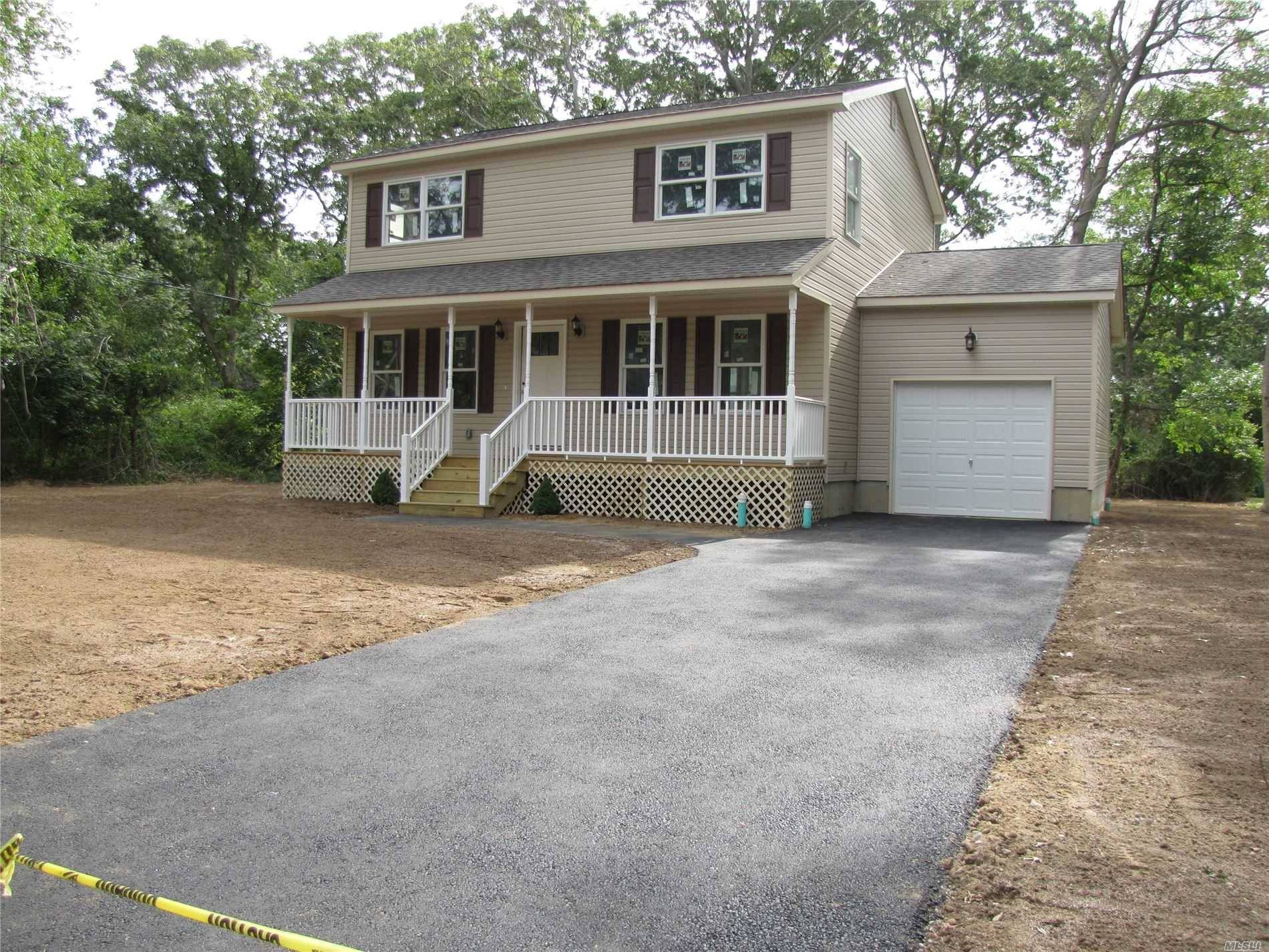 brand new center hall colonial, 8 ft basement, full length front porch, geo thermal heating and central air, garage, 3 bed, 2.