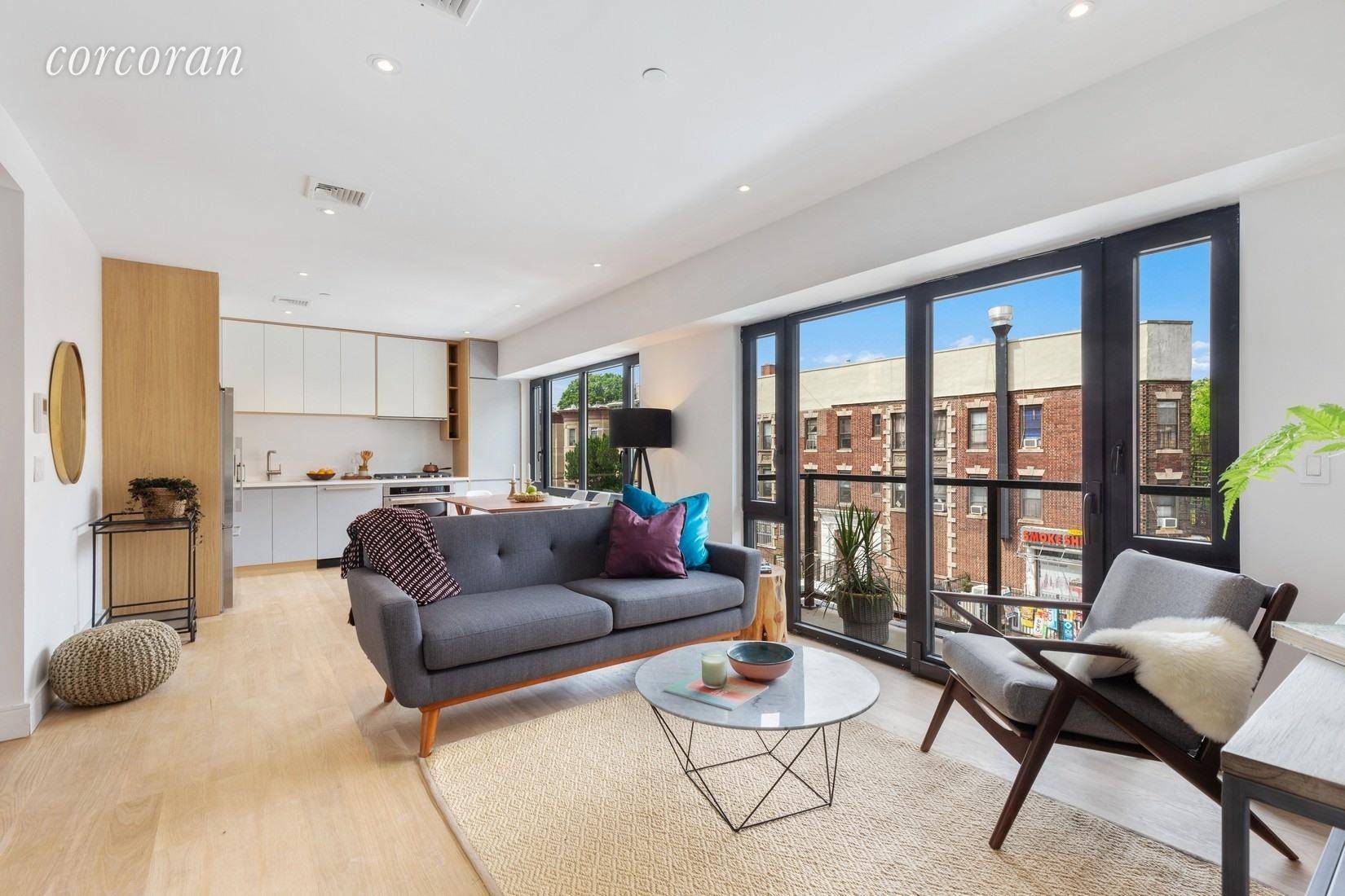 STYLE, QUALITY AND AMENITIES NEVER BEFORE SEEN IN DITMAS PARK Residence 3A at 1702 Newkirk Avenue is a 2 bedroom, 2 bathroom condo with 2 private balconies.