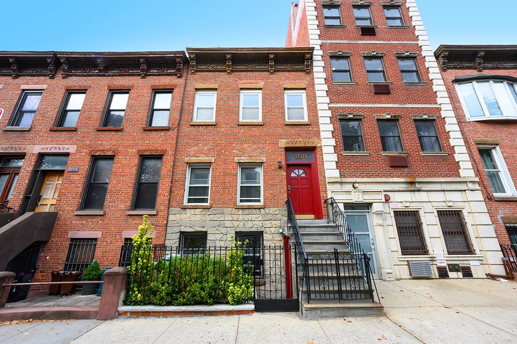Charming 2-family townhouse situated across the street from Prospect Park