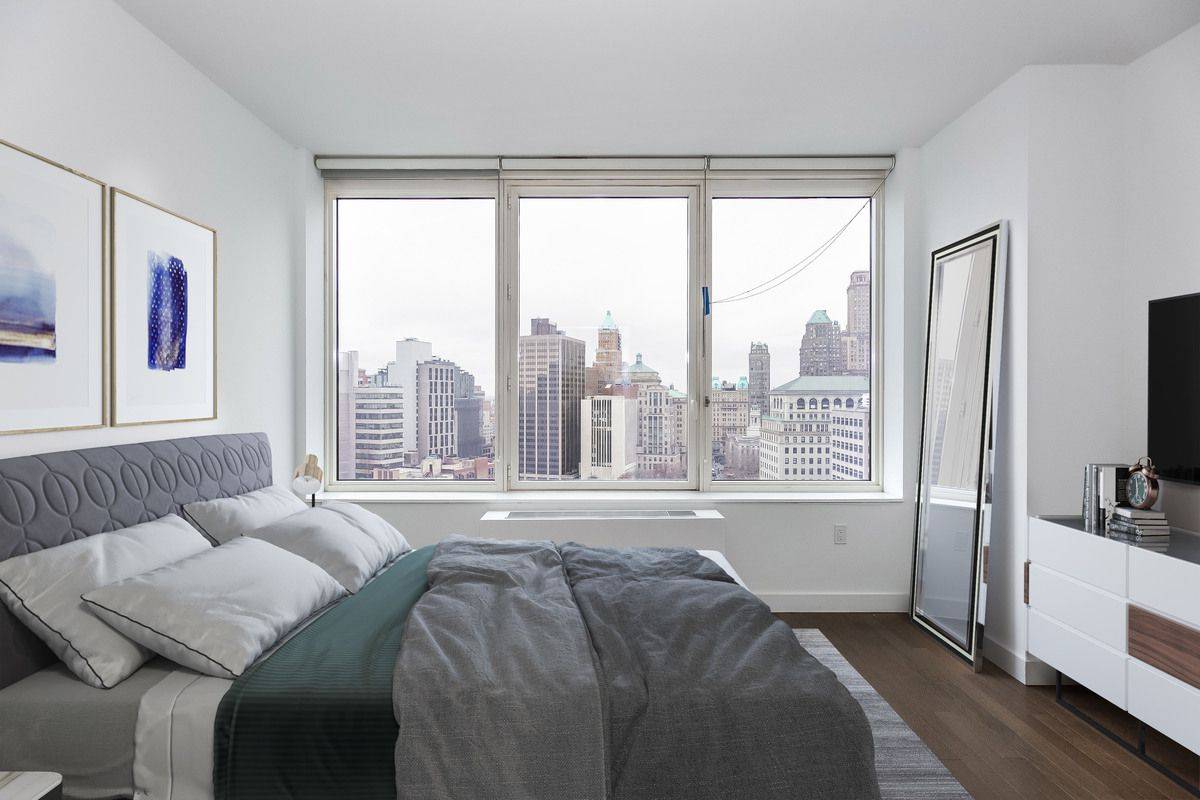 1Bed/1Bath Boasting City and Water Views. Washer/Dryer In Unit.