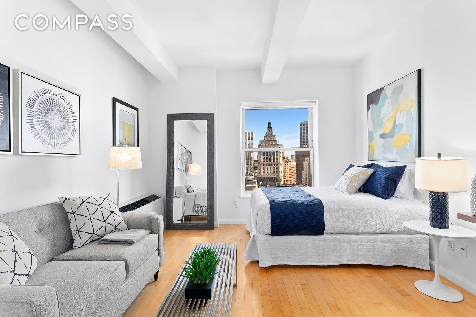 Residence 36G is a high floor studio flooded with sunlight and stunning city views.