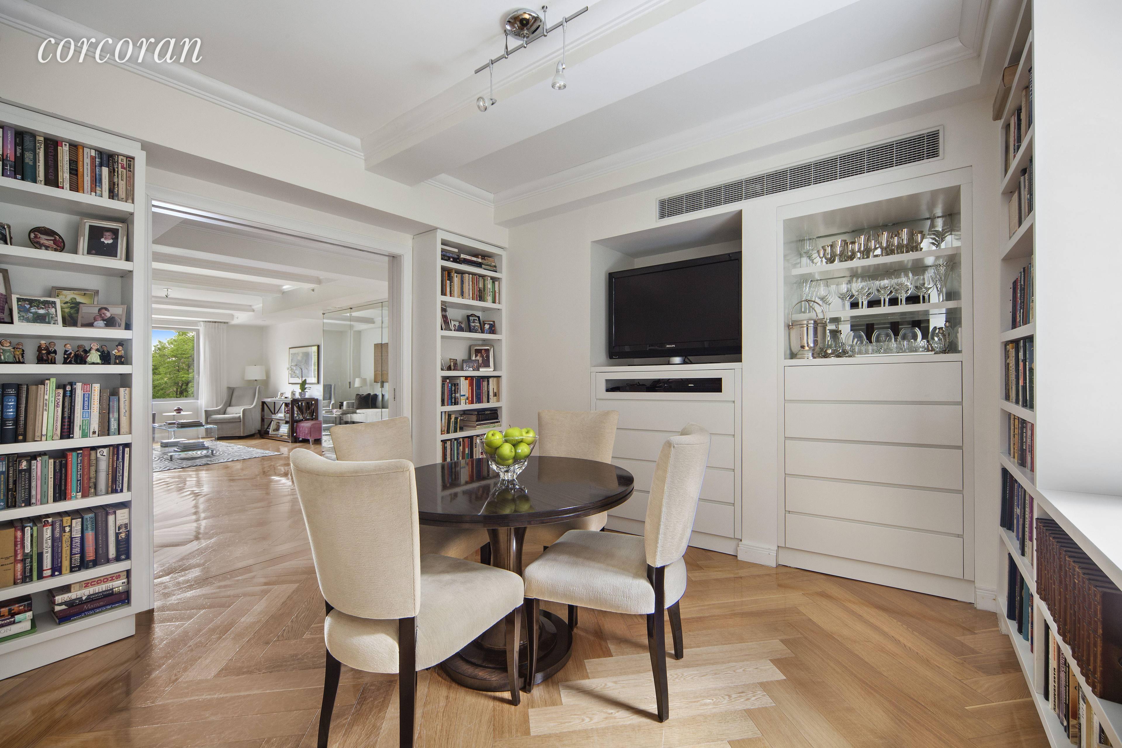 Enjoy direct and unobstructed views of Central Park in this elegant Essex House residence.