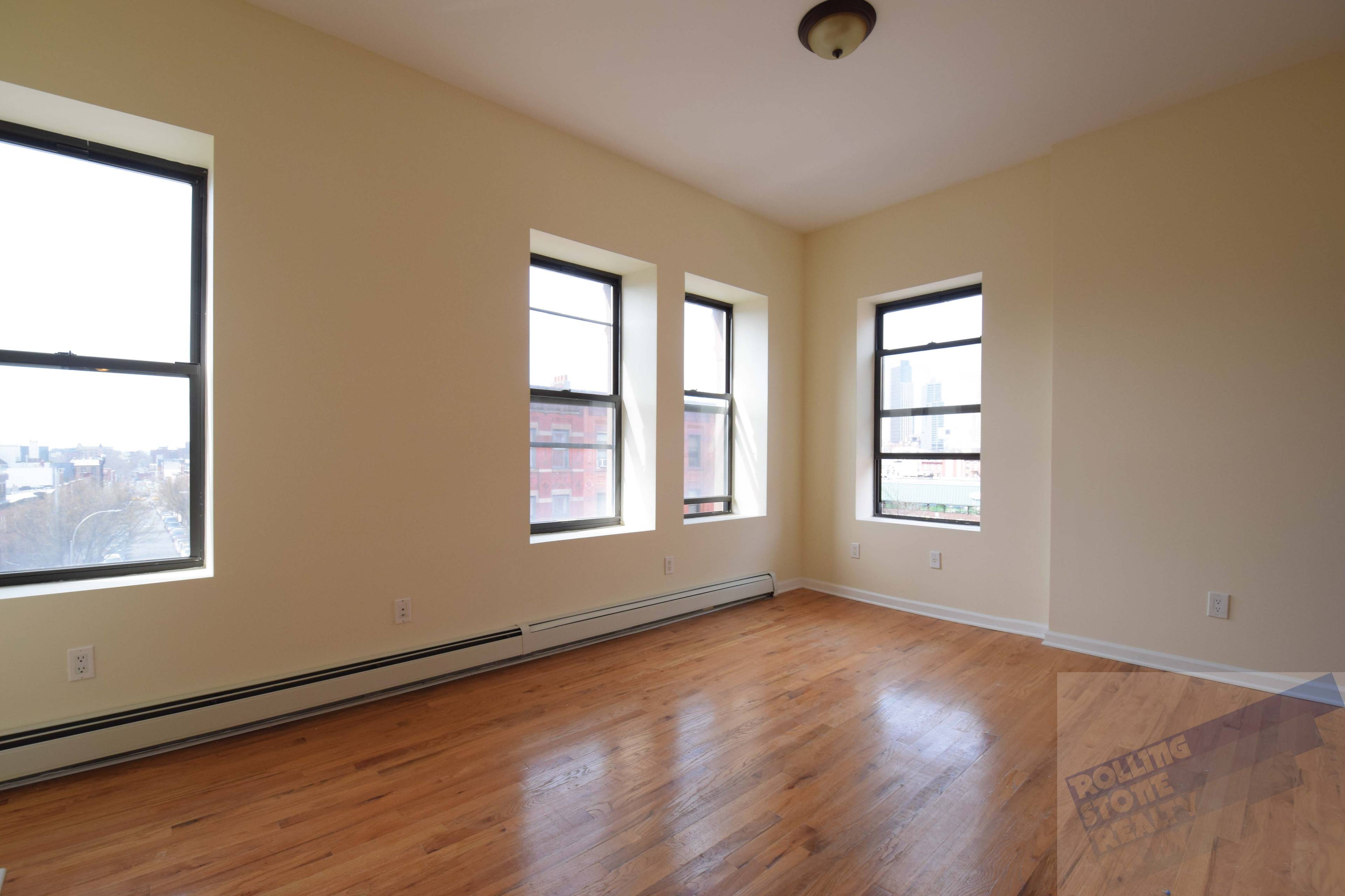 3 bedroom and 2 bathroom Gut renovated Townhouse Floor Through.