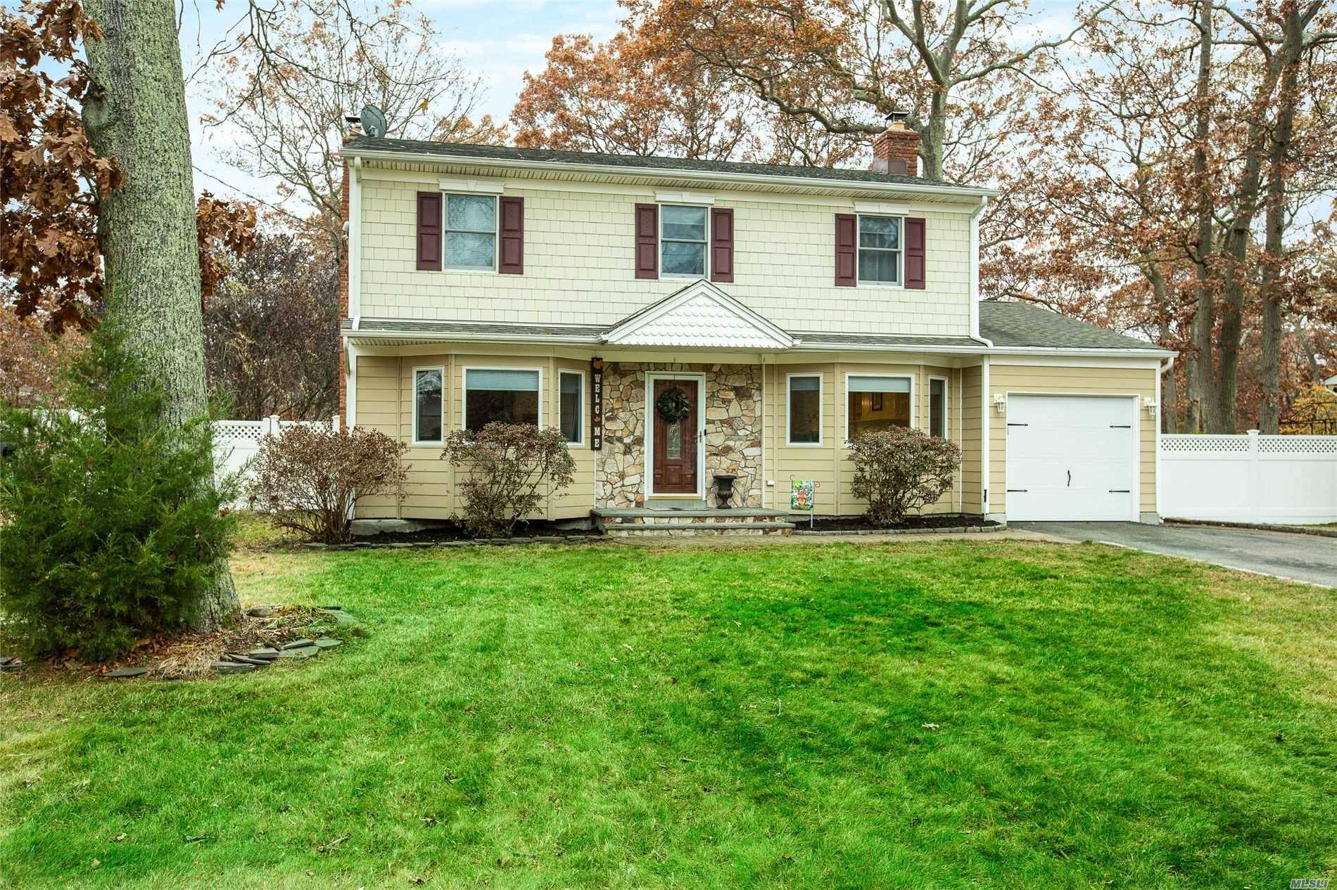 Spacious Colonial Nestled On Over A Half Acre Boasts A Great Floor Plan Ideal For Entertaining Indoors or Out.