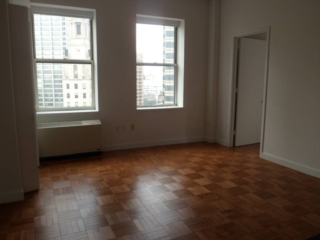 EXTREMELY BRIGHT AND SUNNY UNIT WITH AMAZING UNOBSTRUCTED VIEWS IN THE FINANCIAL DISTRICT - NO FEE