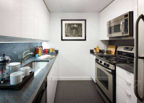 STUNNING STUDIO WITH SOUTHERN EXPOSURE IN THE CENTER OF TRIBECA.