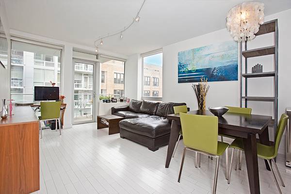One bedroom Luxury Condo + balcony in tax abated  amenity building .