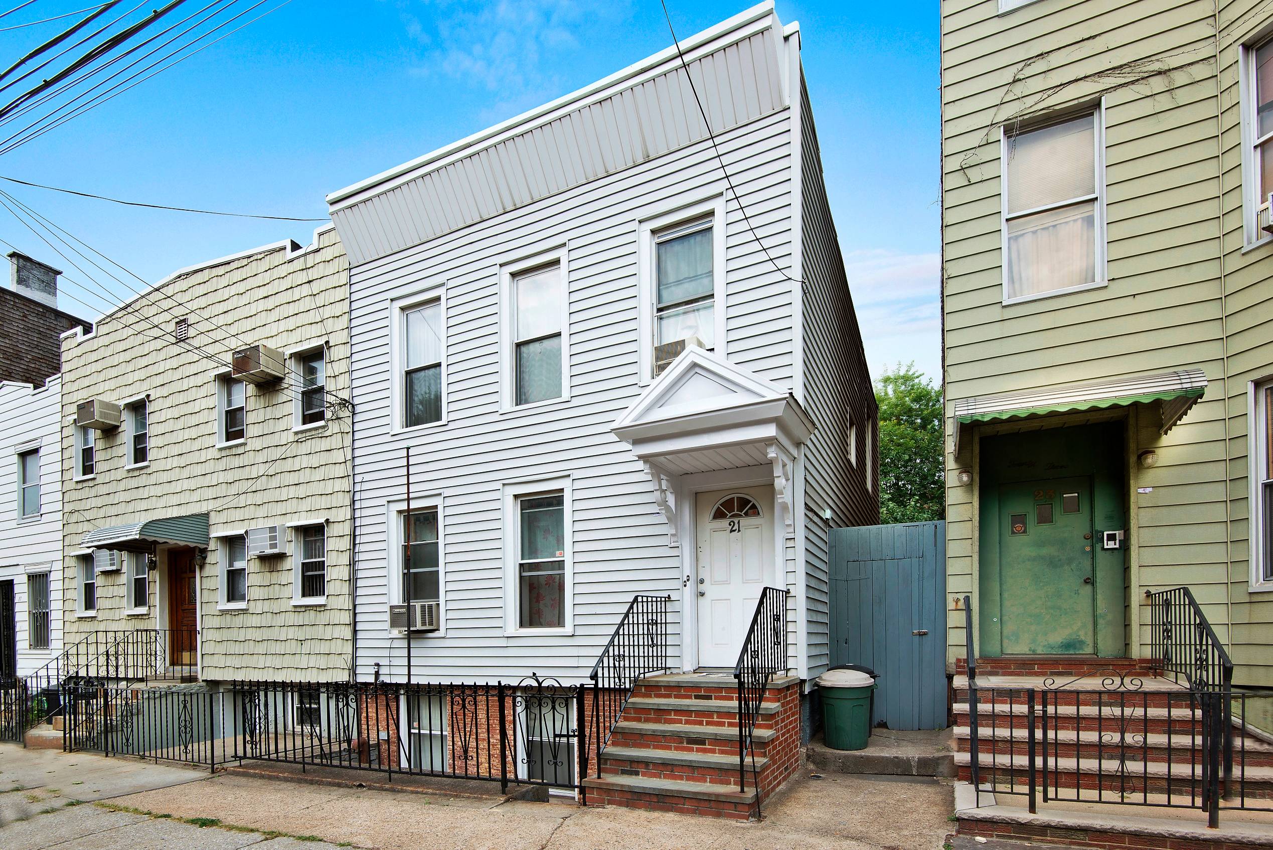 Beautifully Preserved Two Story House Located on a Most Desirable Tree Lined Street