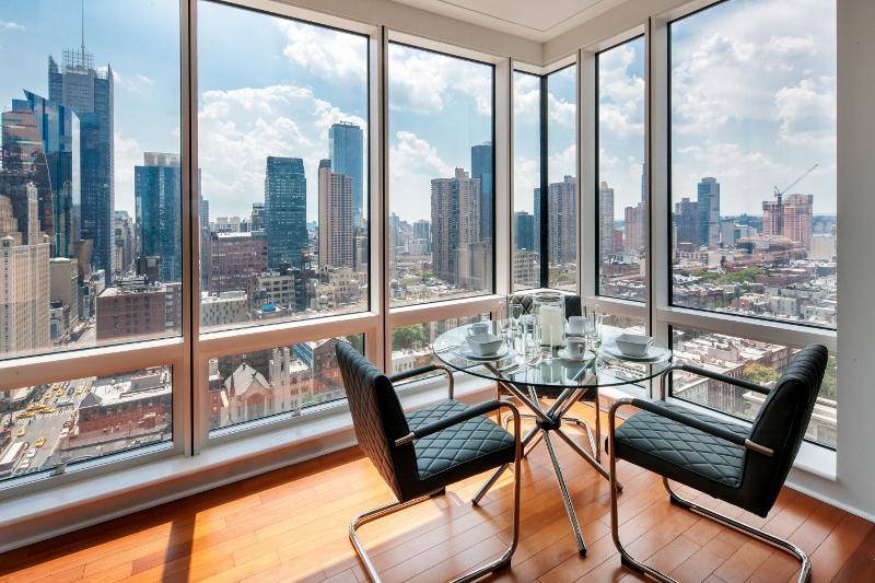 Midtown West. Loft like One Bedroom. Private glass terrace. Chef's kitchen. Luxurious Condo Finishes. Washer/dryer. No fee. 