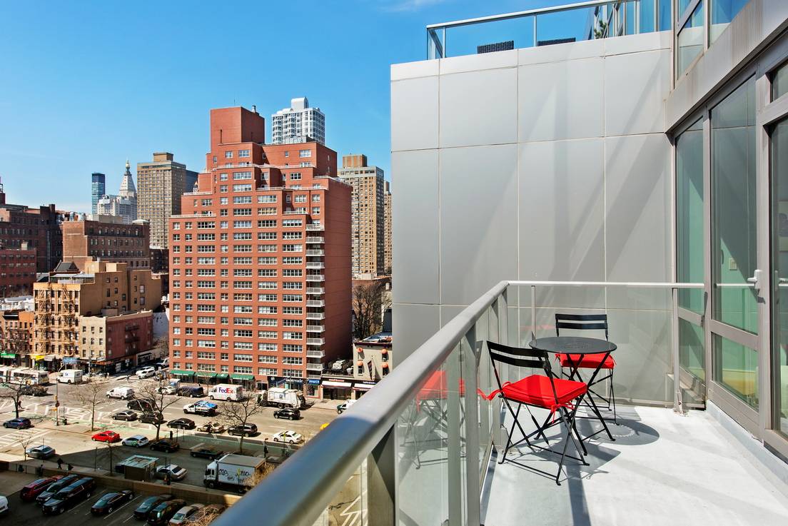 Oversized luxury one bedroom with sun flooded balcony and Empire state building views.