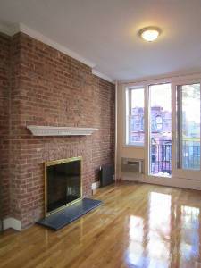 **STUNNING 2 BEDROOMS 1 BATHROOM IN EAST VILLAGE FOR RENT ~ BALCONY ~ FIREPLACE ~ EXPOSED BRICK ~ WASHER AND DRYER ~ DEAL OF THE DAY!**