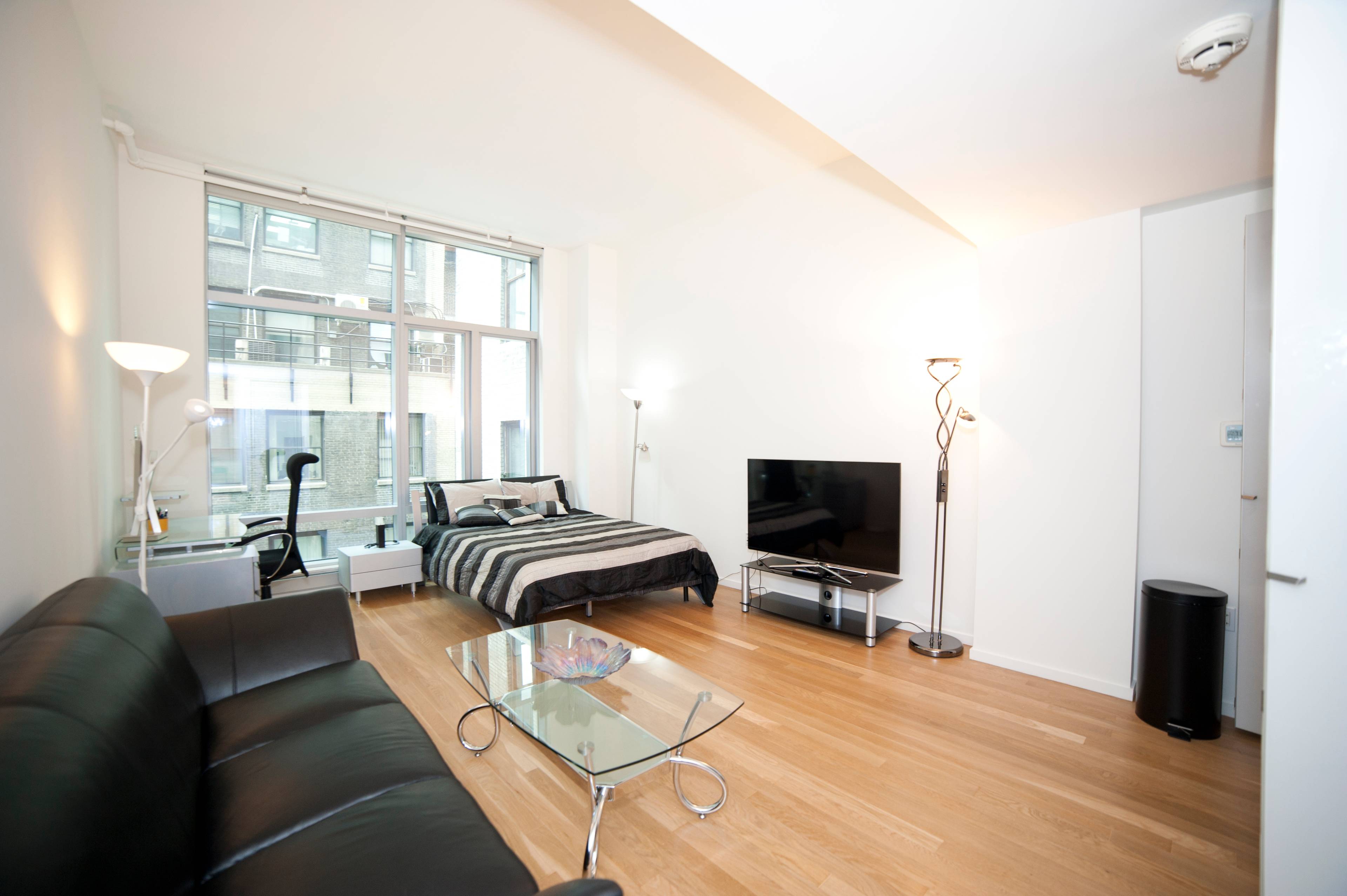 **18 W.48 St. Condo **Studio with 11feet Ceiling **Modern Glass tower **Full Service