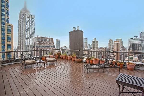  ** BRING YOUR ARCHITECT **MOTIVATED SELLER *****PENTHOUSE TRIPLEX with Unobstructed City views on Fifth avenue**