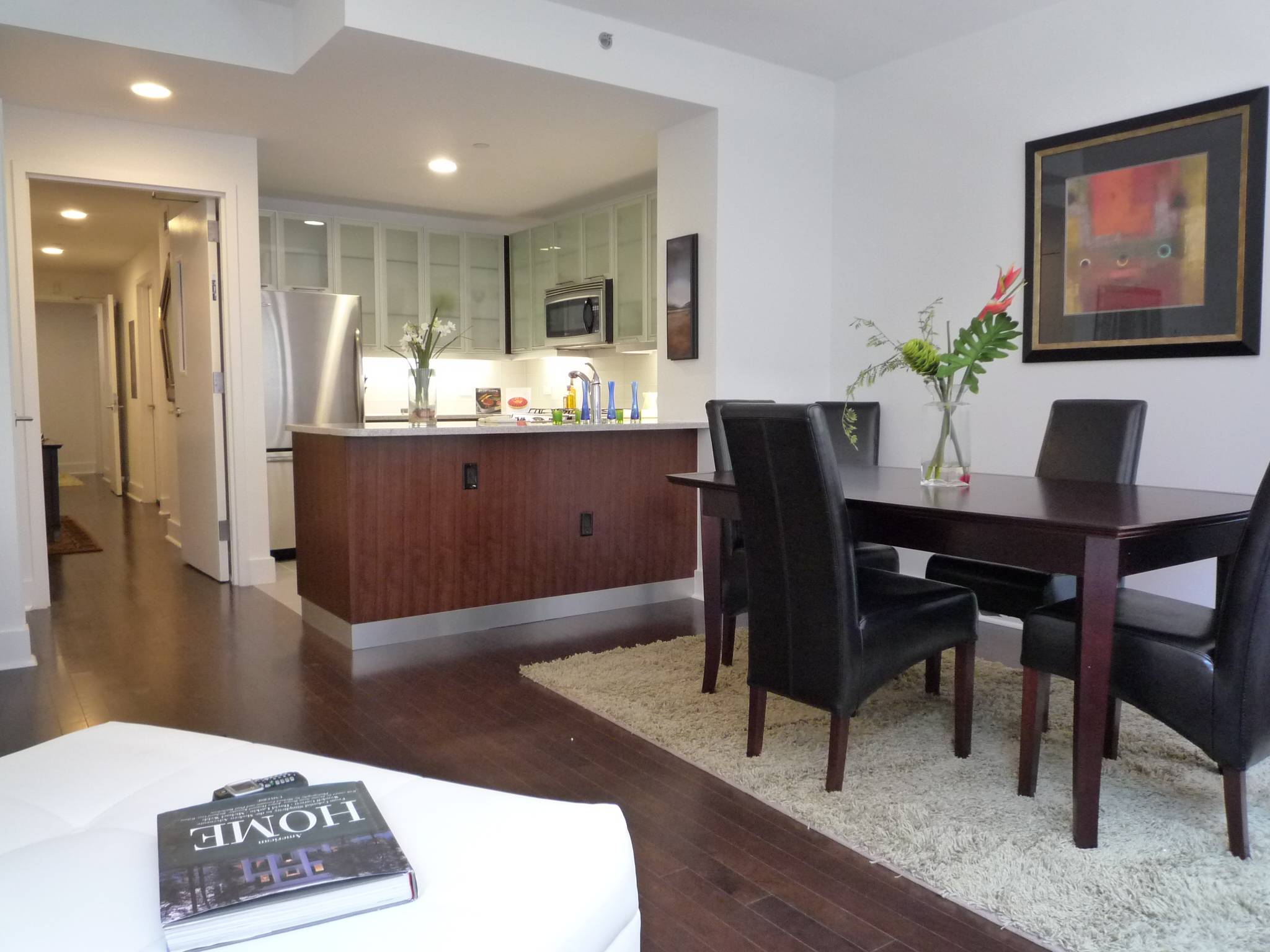 Trendy 1 bedroom,1 bathroom in Chelsea. Direct view of Empire State Building, Dark Espresso Hardwood Floors, Floor to Ceiling Windows, Stainless Steel Appliances, Washer/Dryer in Apt, White Granite Kitchen.