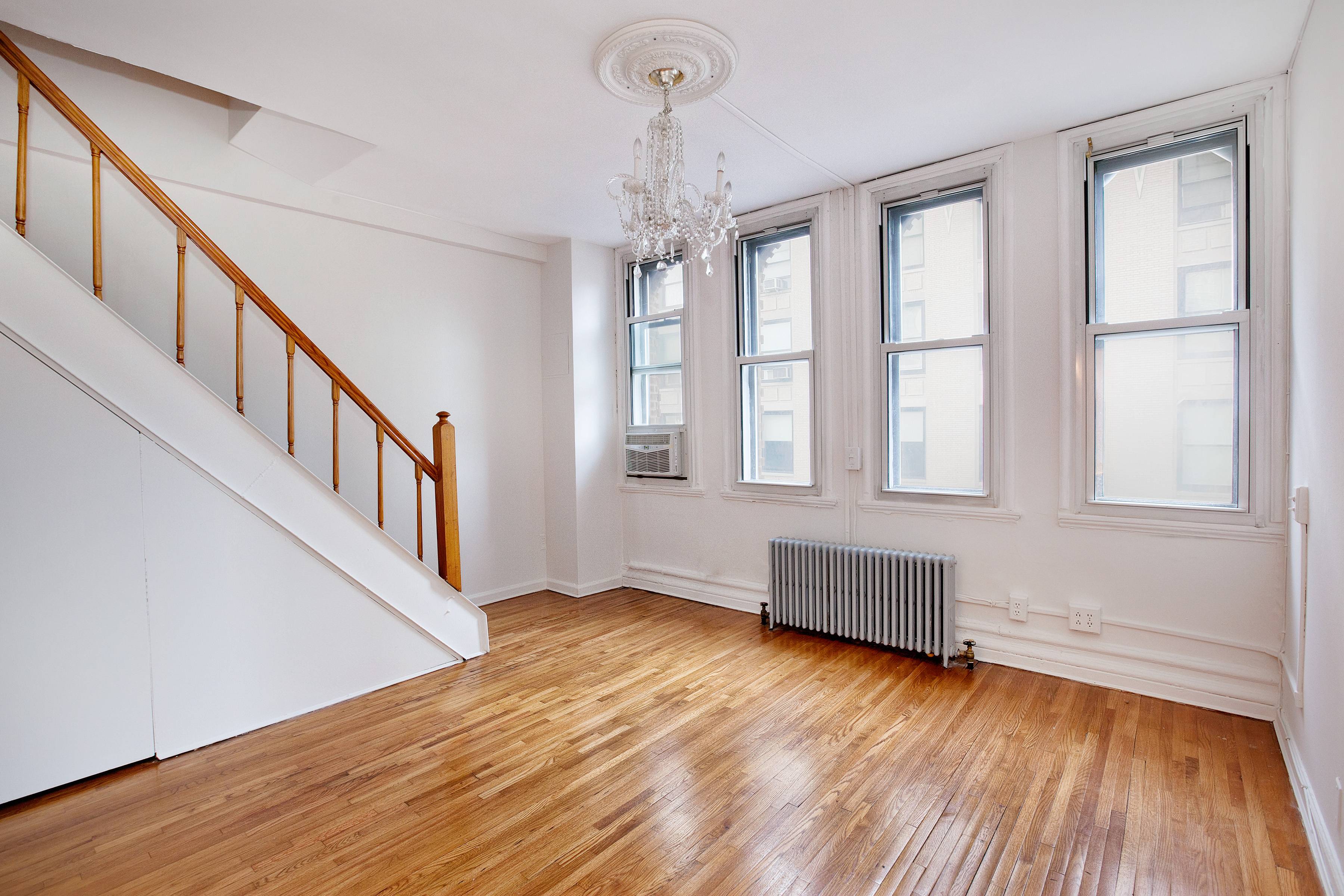 Flatiron Duplex 2BR/1.5BA King Size Bedrooms High Ceilings Sun-Blasted Original Hardwood Floors Oversized Windows & Terrace