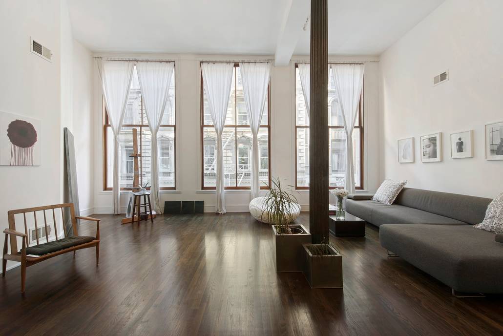 Rarely Available Oversized 2 bedroom Condo Loft at Tribeca Lofts with 14 Foot Ceilings 