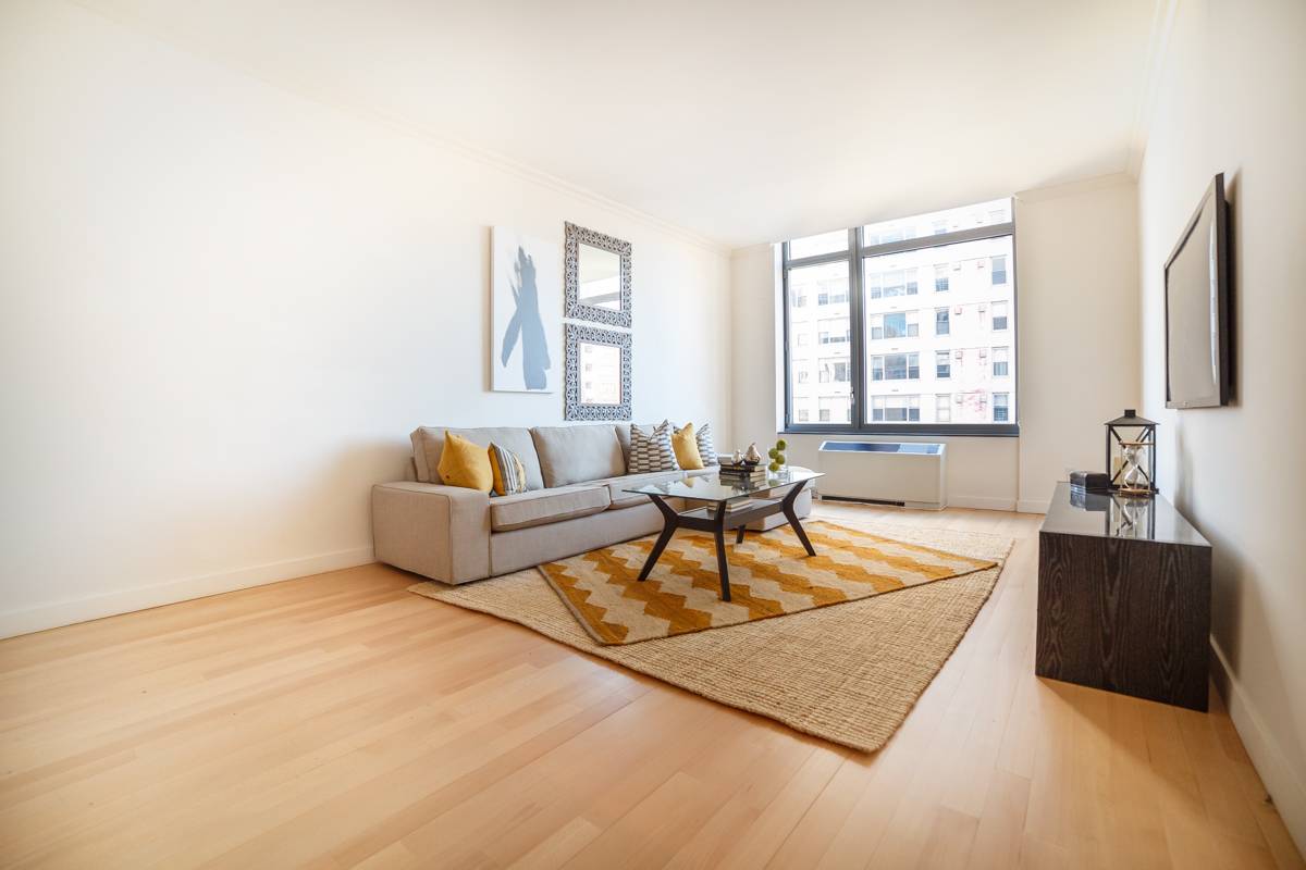 Soaring 10.5' Ceilings in White Glove Condominium! Oversized Windows, Gym, Parking, and More
