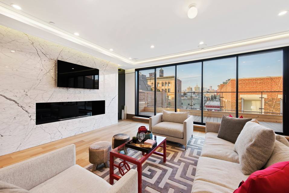 Masterfully Curated Three-bedroom, Three and One-half Bathroom Crown Penthouse at the Walker House