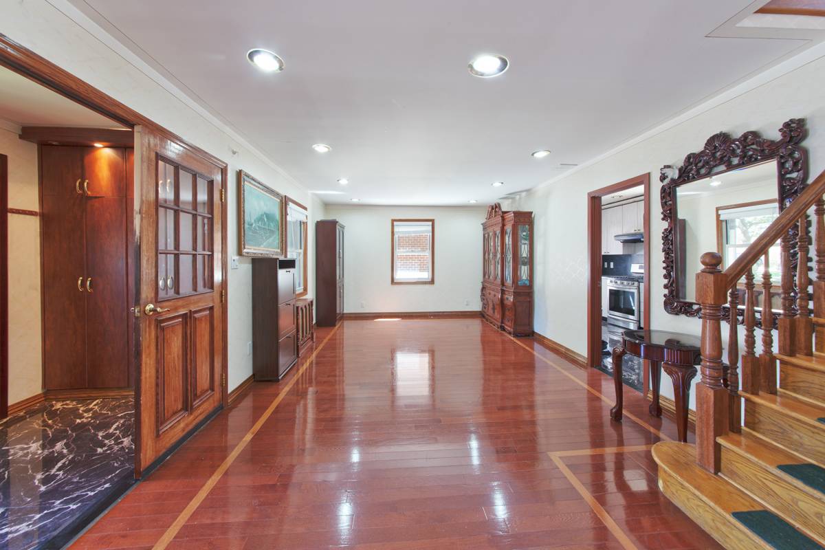 Jamaica Estates: Just Hit The Market, Massive lot, Recently Renovated, Great investment, Prime Location, Extremely Sunny!