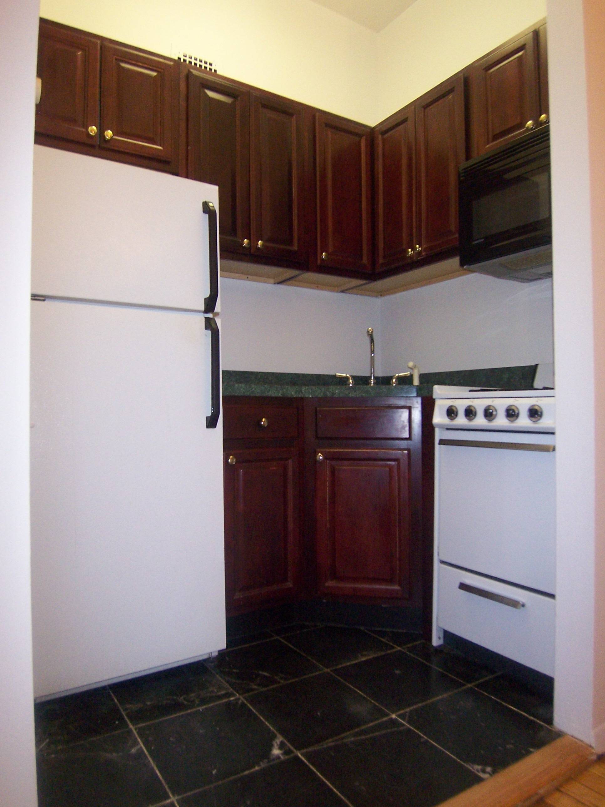 Charming UWS Two Bedroom Apartment With Hardwood Floors And Exposed Brick. Located In An Elevator Building