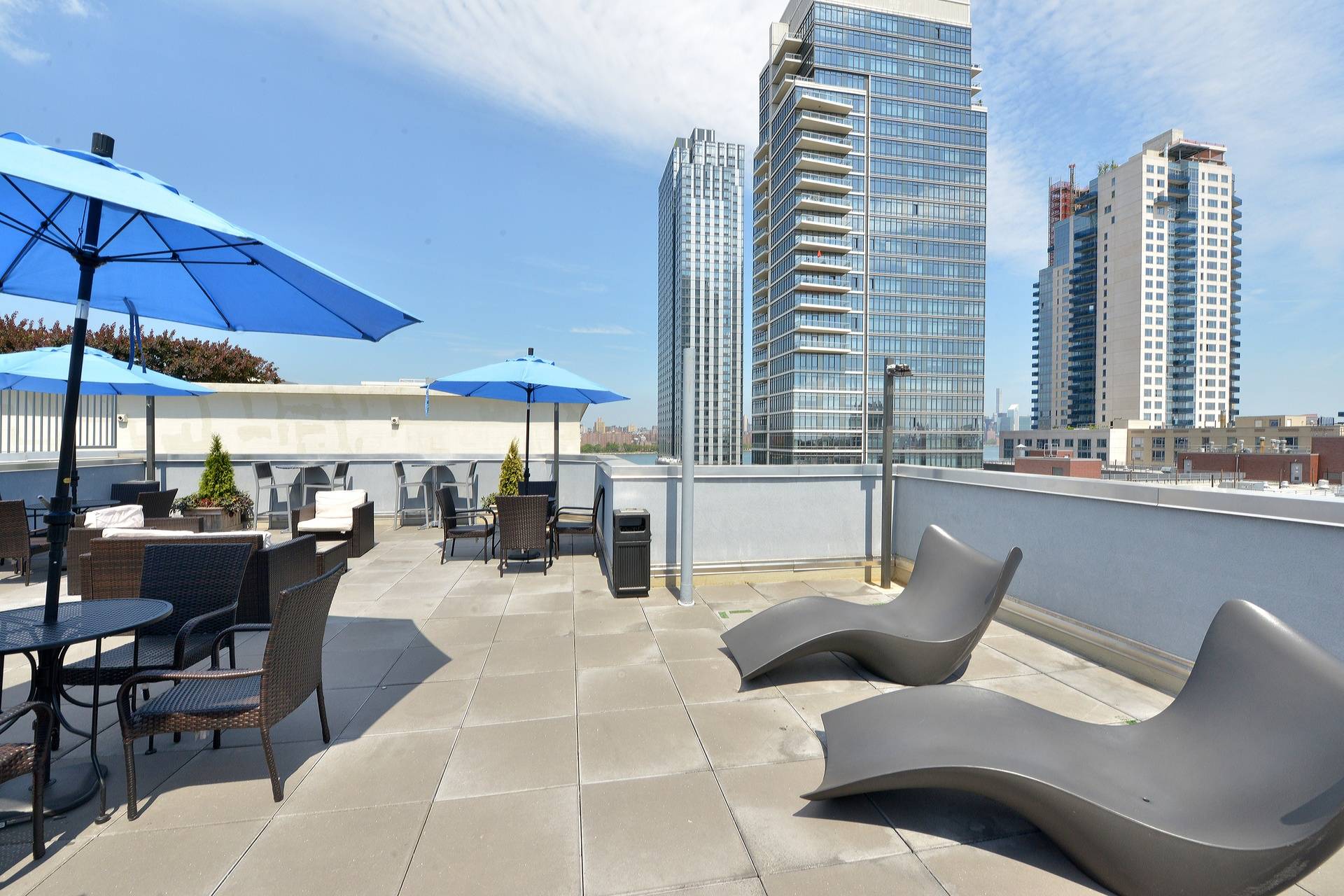 Sprawling 4 Bedroom w/2 Full Bathrooms in Prime Williamsburg Luxury Building w/Pool, Gym, and Parking