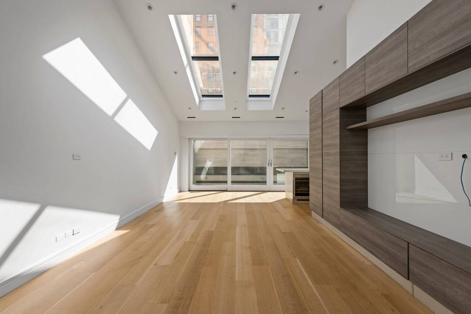 Sun Flooded duplex PH with TONS of outdoor space!