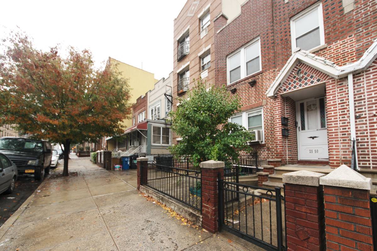 Astoria: Attached 2 Family House in Prime Location with Garage