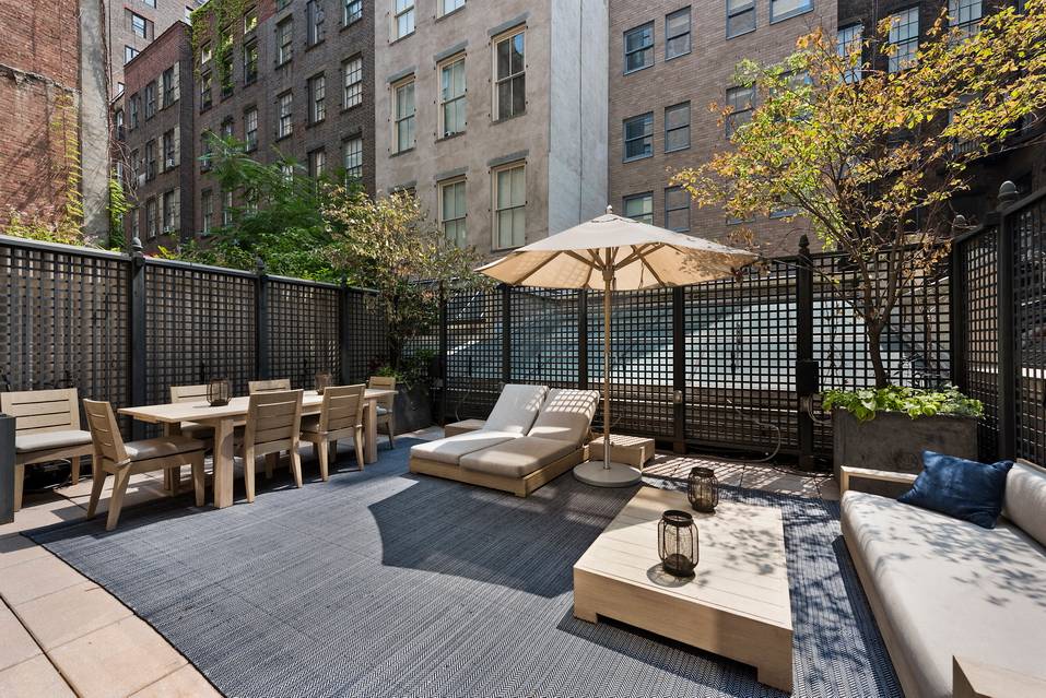 Split level Condo with private outdoor space in the heart of SoHo!