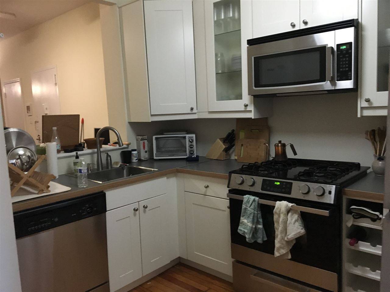 You will love this uptown two bedroom one bath condo rental with high ceilings