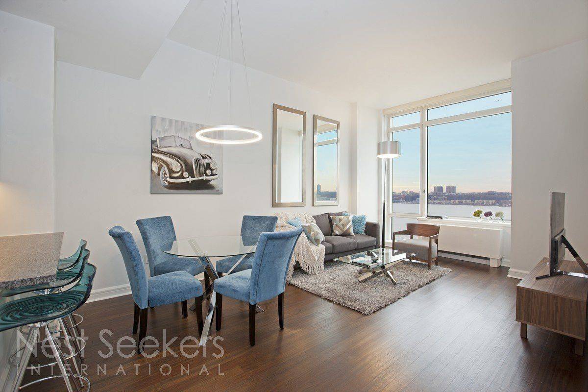 NEWLY RENOVATED RIVER FACING TWO BED WITH HIGH CEILINGS AT THE AVERY!