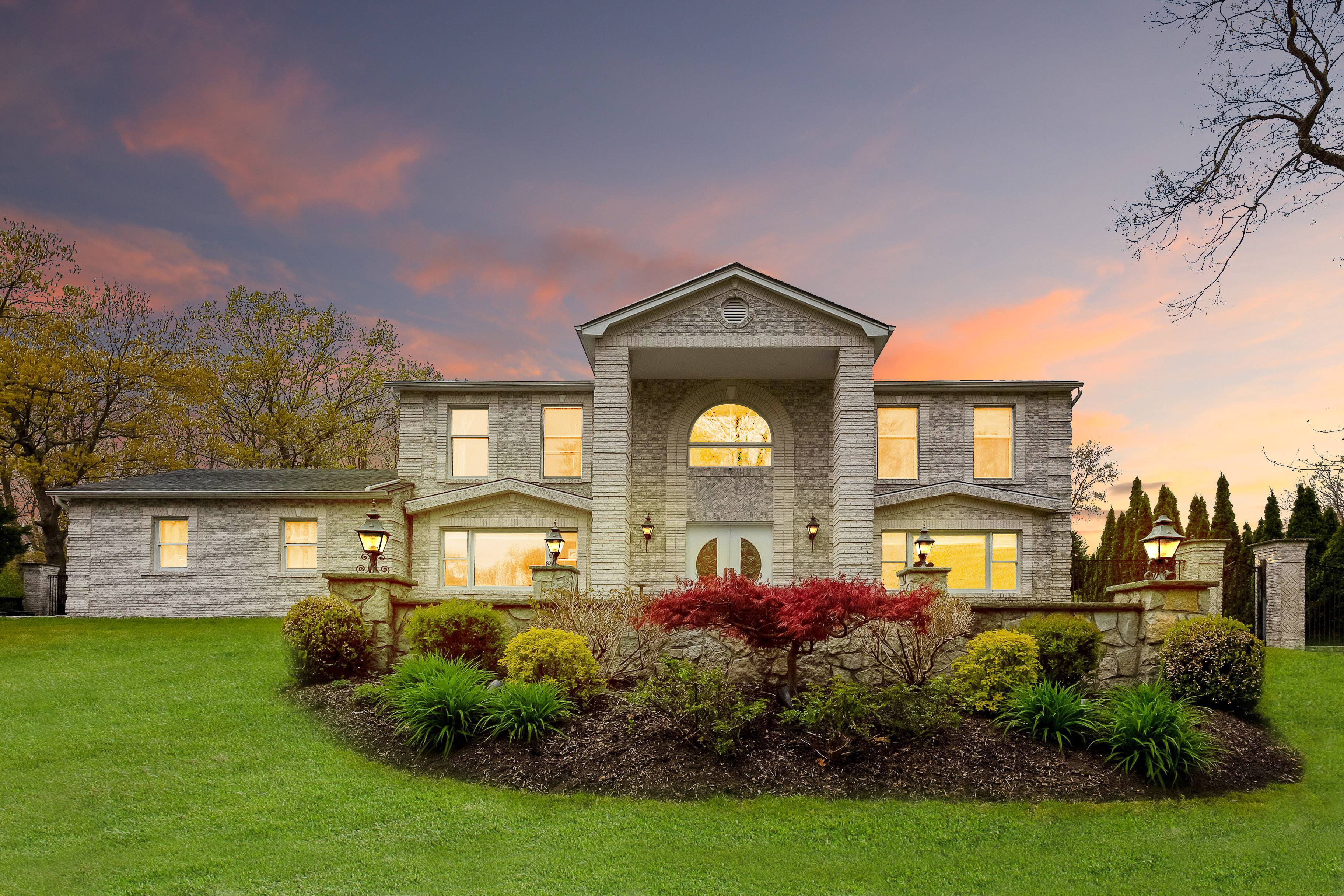 Elegant Brick Center Hall Colonial