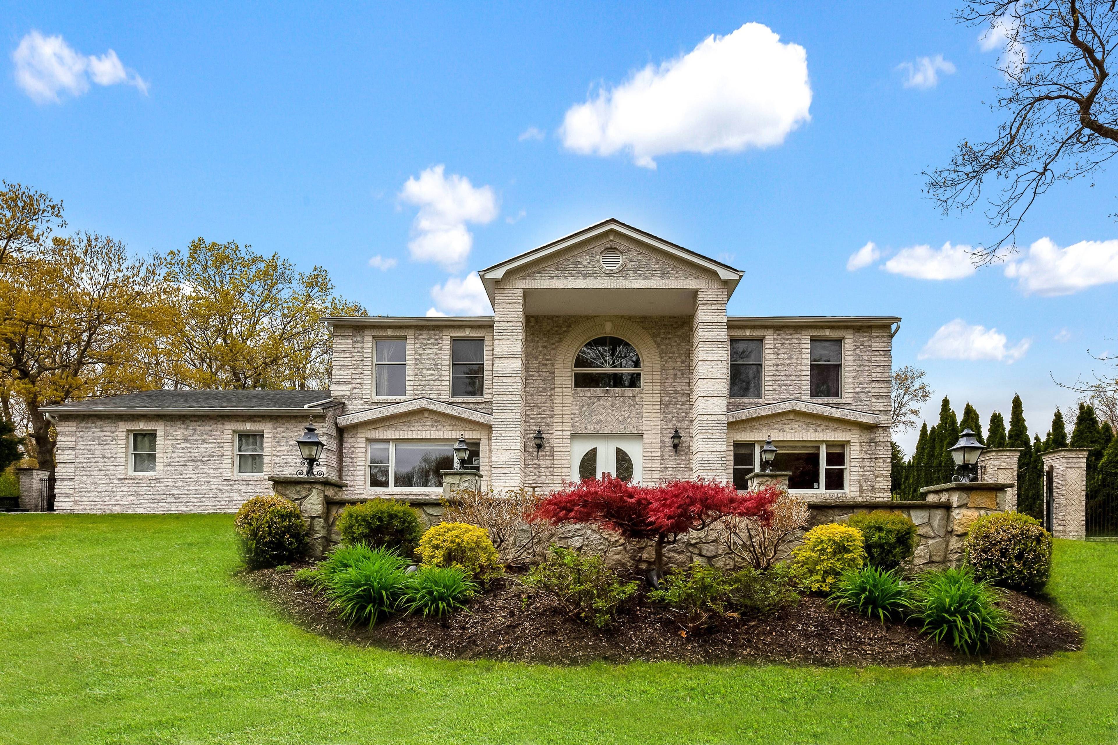 Elegant Brick Center Hall Colonial