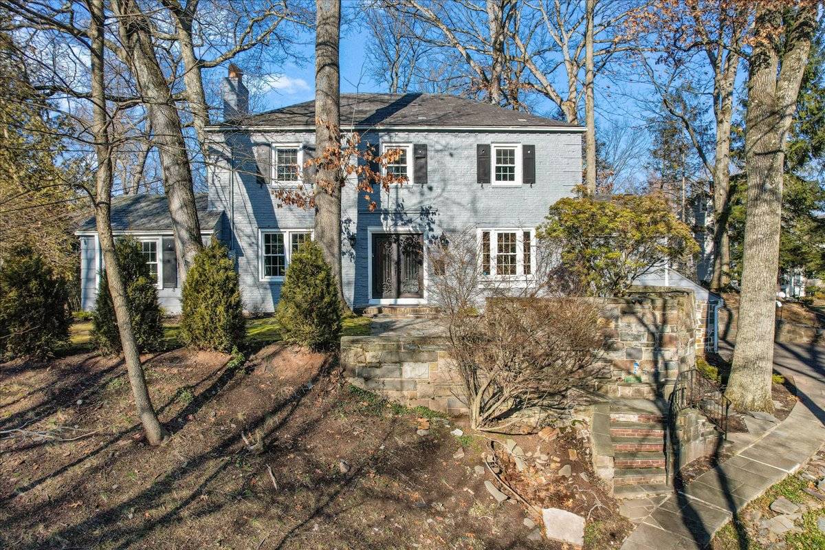 STUNNING RENOVATED FOUR BEDROOM COLONIAL IN THE HEART OF SLEEPY HOLLOW, SITUATED HIGH ON A HILLABOVE THE STREET SURROUNDED BY A BEAUTIFUL WOODED SETTING