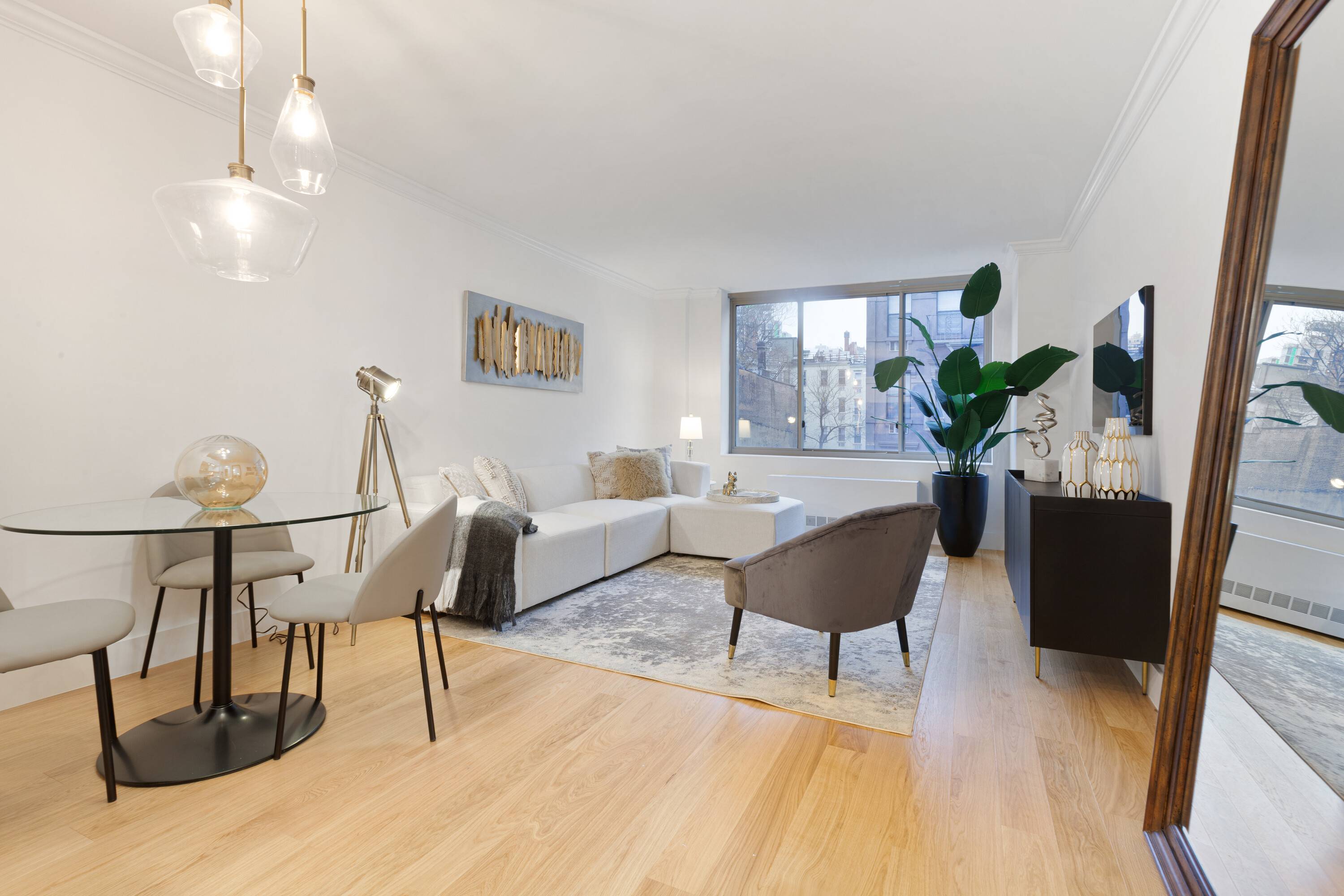 Bright, sunny, sleek and move in ready oversized one bedroom condo in a white glove building with hotel-like amenities awaits you