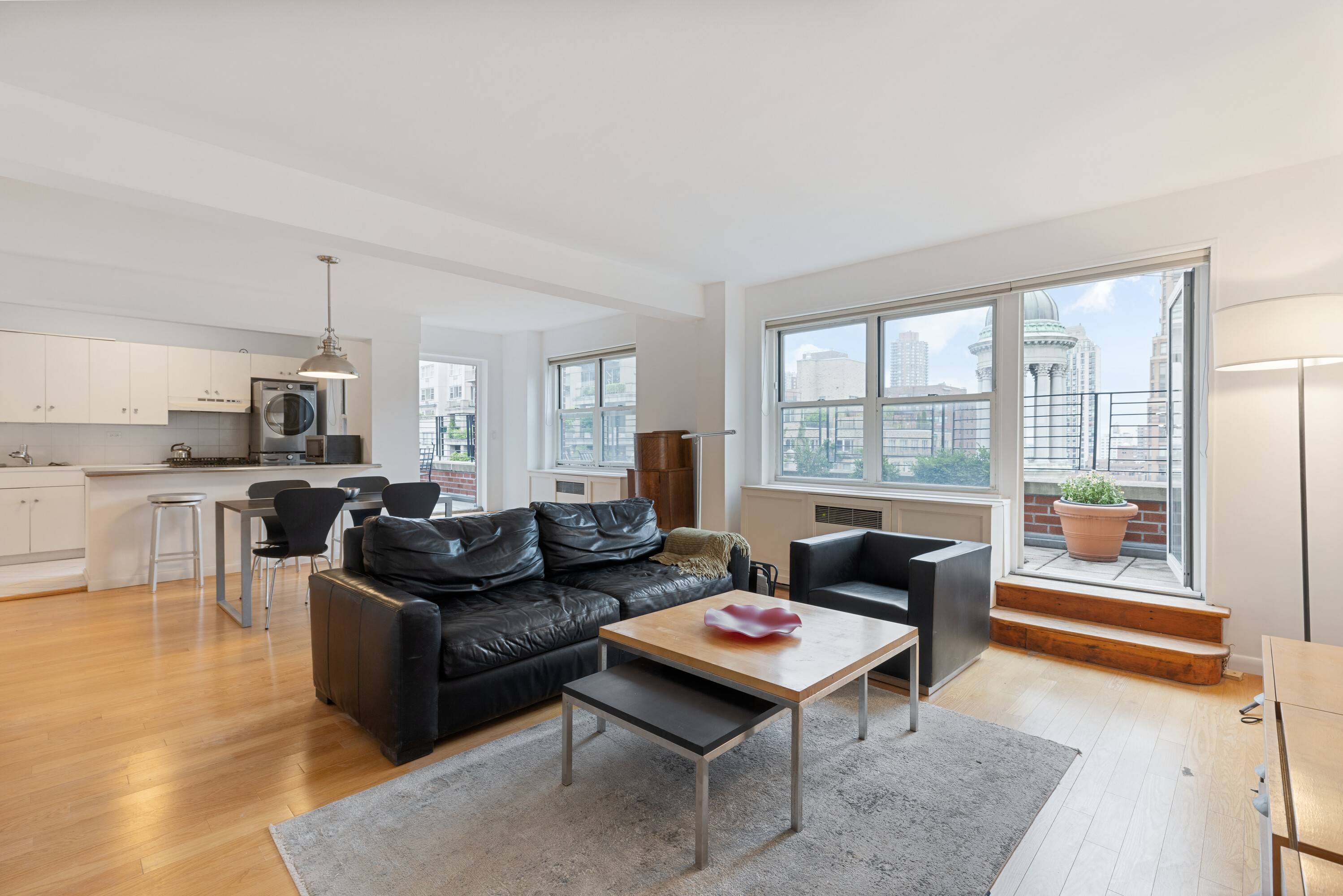 Large and bright Loft-like 2 bedroom co-op with breathtaking views of St Jean Baptiste Cathedral, you might even think you're in Paris.