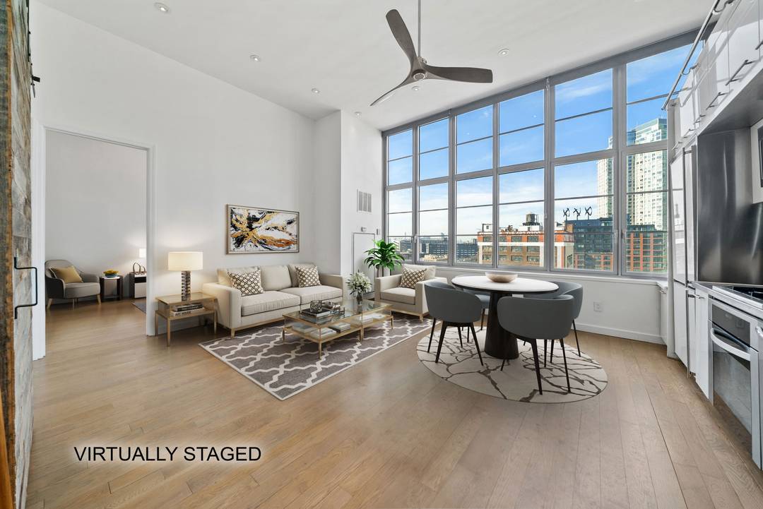 Panoramic views of the East River Manhattan Styling  with 13' ceilings  Loft in Long Island City