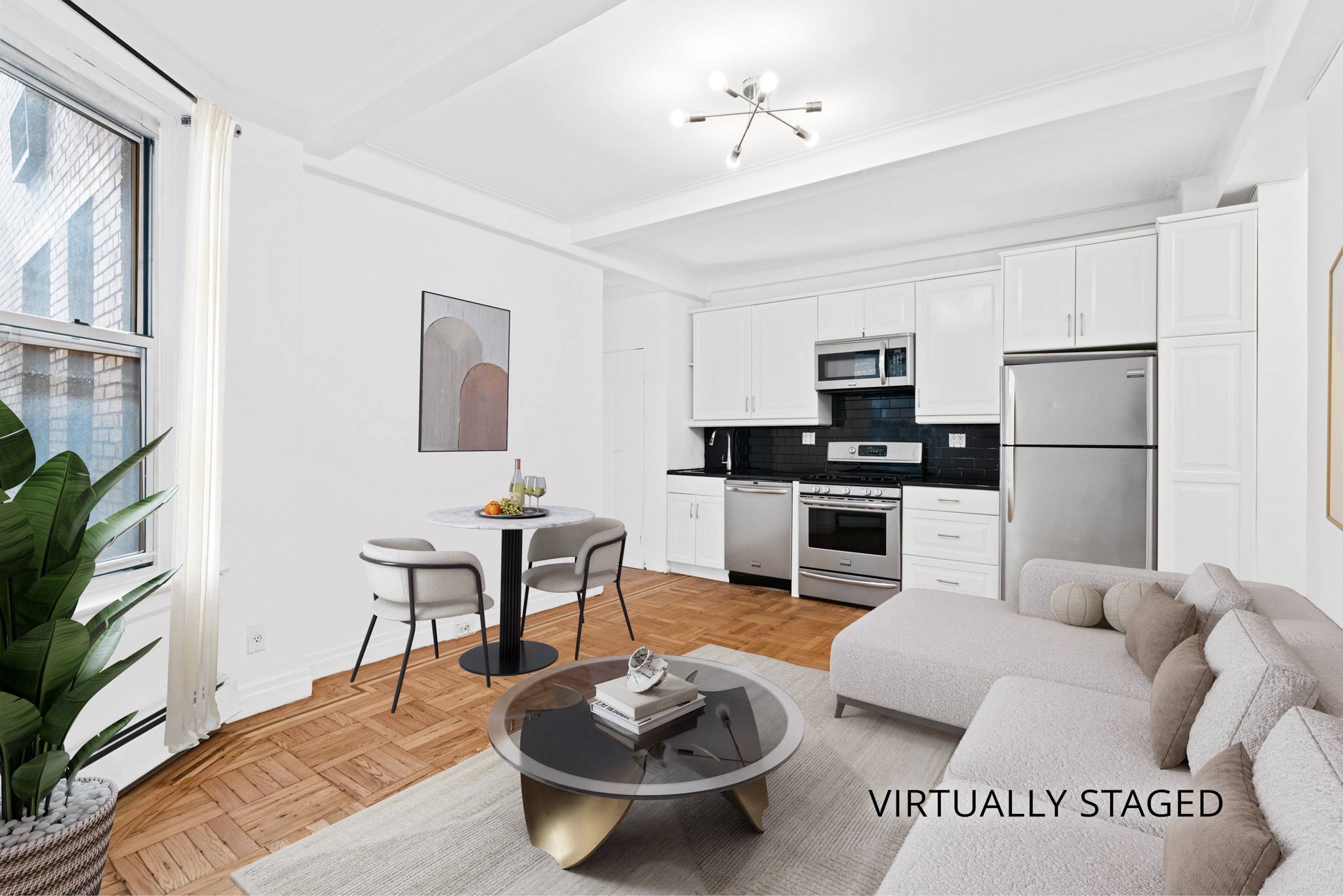 Bright, sunny, sleek and move in ready one bedroom home in the theater district awaits you
