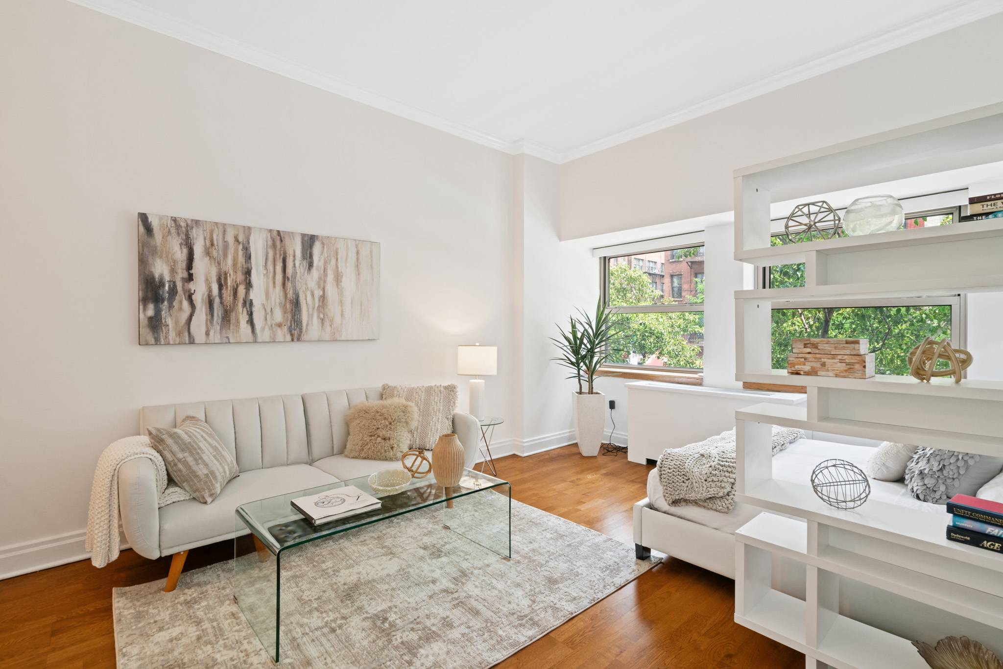 Loft-like, spacious condo studio with 10 ft ceilings and tree tops views available  in the Wellington tower.