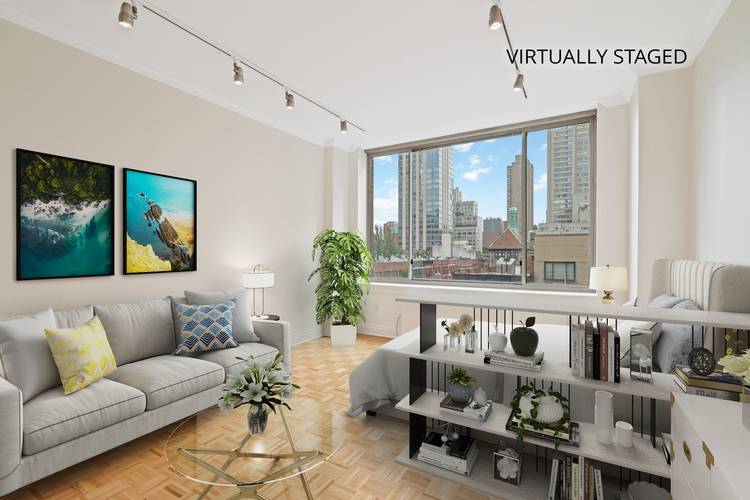 Bright, sunny, sleek and move in ready oversized studio condo in a white glove building with hotel-like amenities awaits you