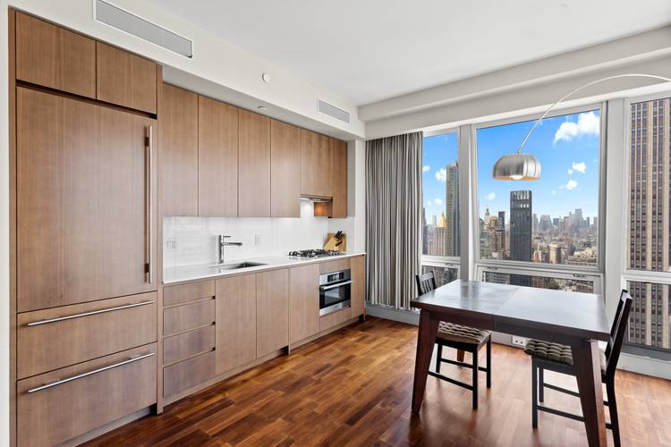 1 bedroom, 1.5 bath condo with plenty of natural sunlight and spectacular views of the Empire State Building and Hudson River