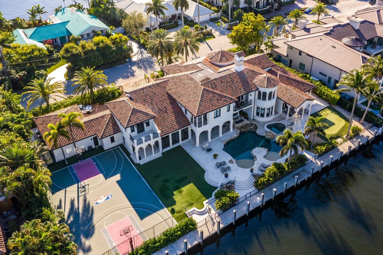 Luxury Mediterranean Estate in Exclusive Gated Community in Fort Lauderdale. Deep Water Frontage for Mega Yacht. Double Lot. NBA Basketball Court. Swimming Pool With Grottos and Water Slide.
