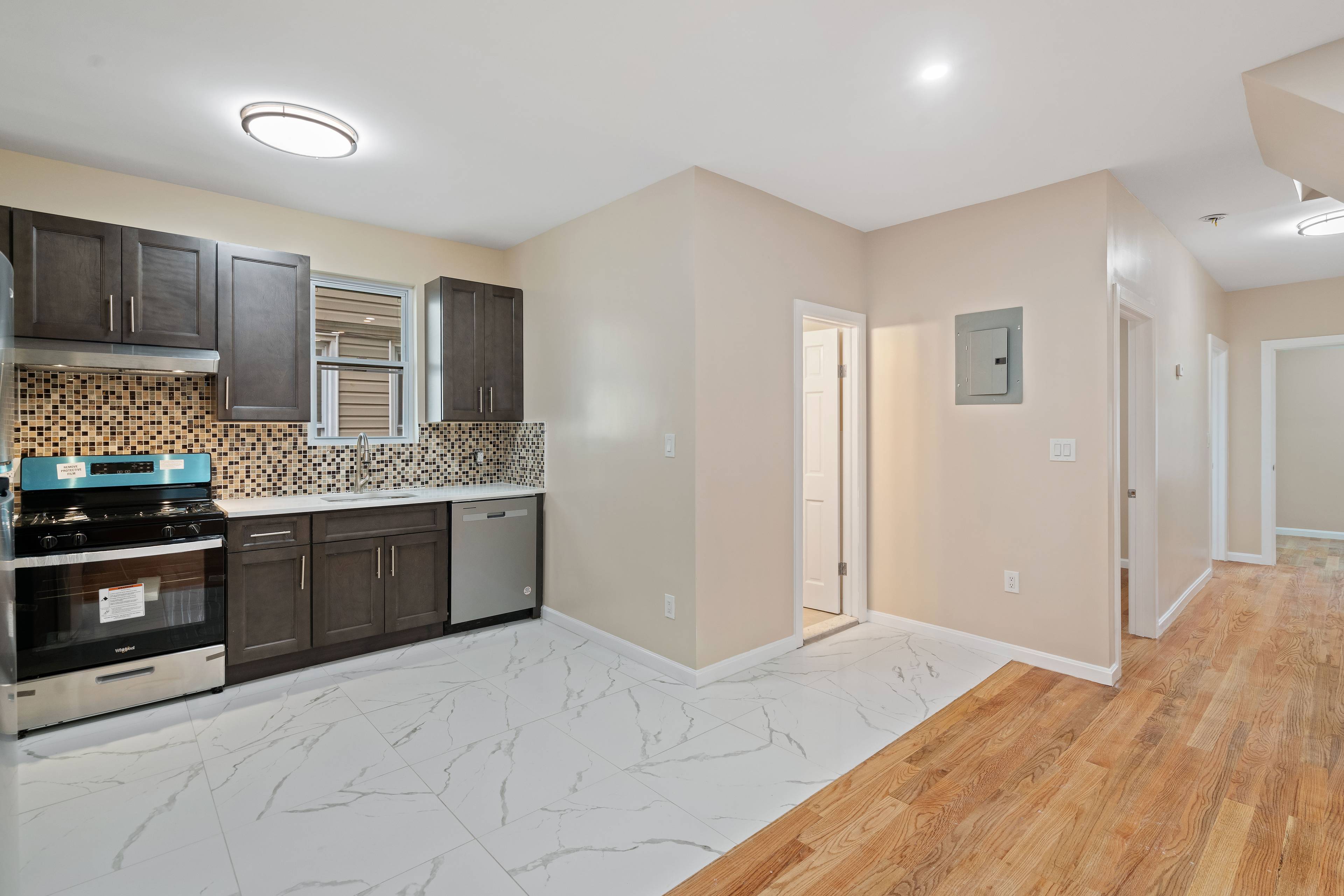 Beautifully Gut Renovated Large Detached Colonial Two-Family Home