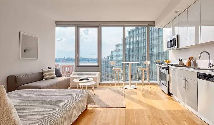 Midtown West Studio Home with Water Views, Floor-to-Ceiling Windows, W/D