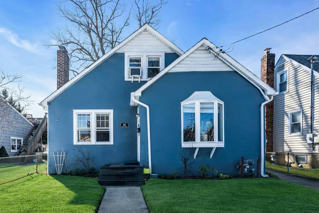 Classic Tudor located in the heart of Massapequa Woods