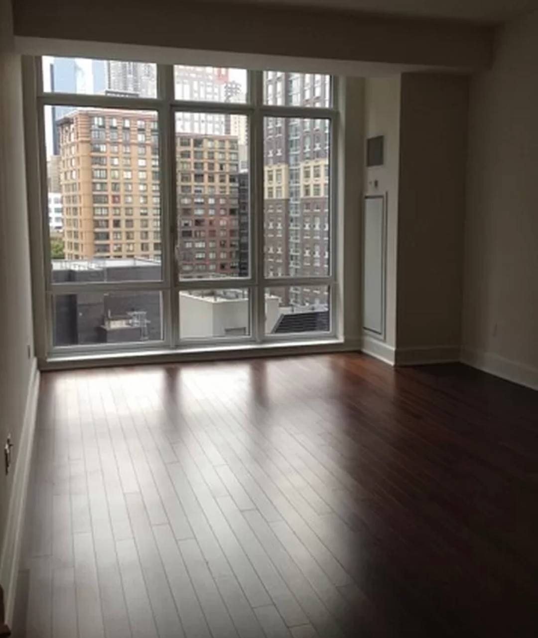 Luxury one bed and one bath apartment with spacious open kitchen and custom teak finished cabinetry