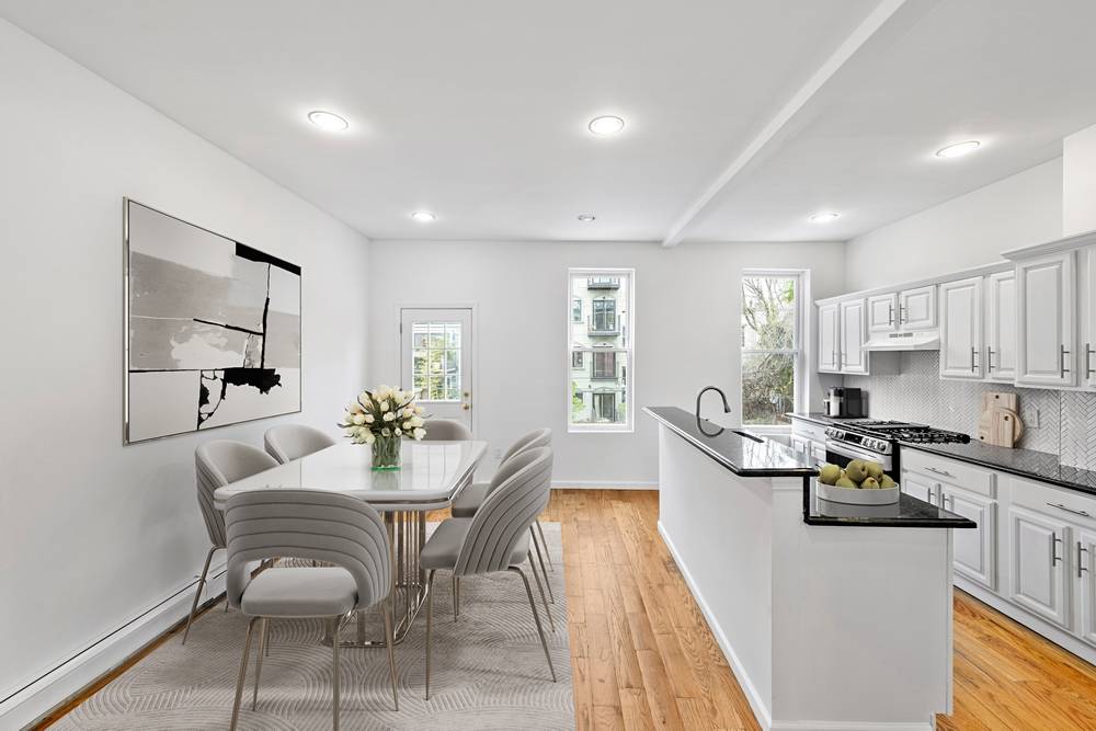 Renovated Multi-Family Townhouse with Lush Backyard and Rental Unit