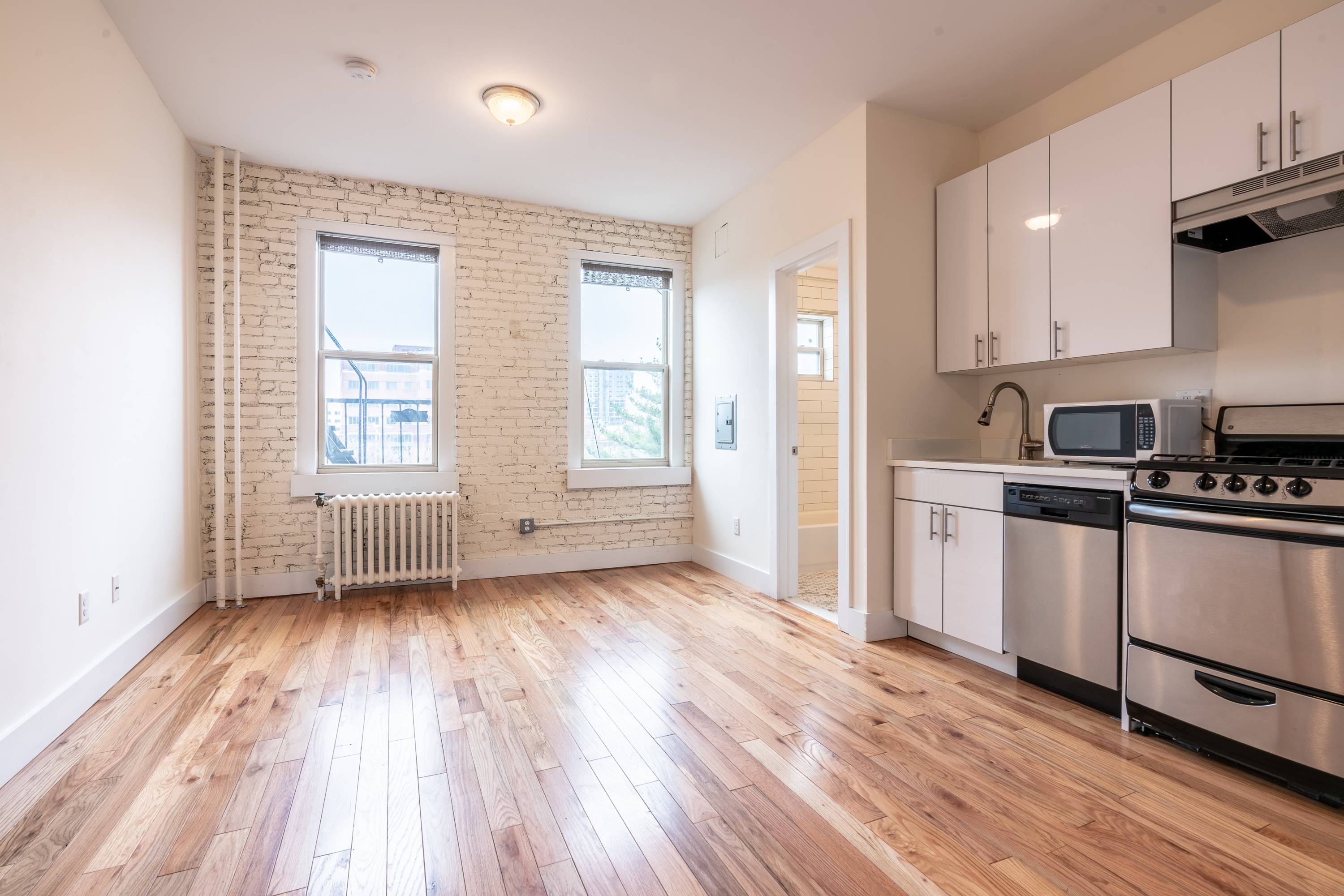 Stunning Renovated Studio in Prime Journal Square Location!  Laundry on Site, Seconds to the Journal Square Path Transportation Center!