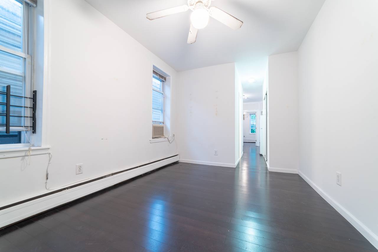 Renovated 1 Bedroom Apartment located in Journal Square!  Renovated Bathroom.  No Broker Fee